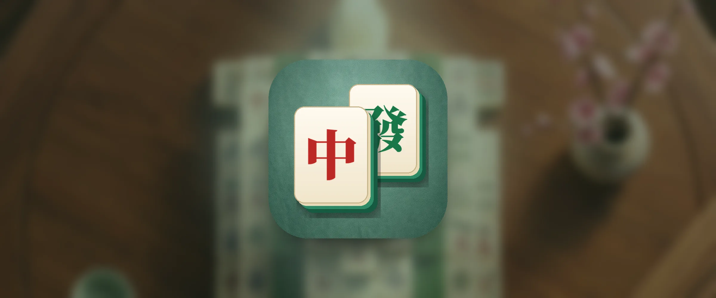 The Jade Pavilion Mahjong icon, two ivory mahjong tiles with jade-green backs, a red Zhong tile in front of a green Fa tile, on jade-green felt