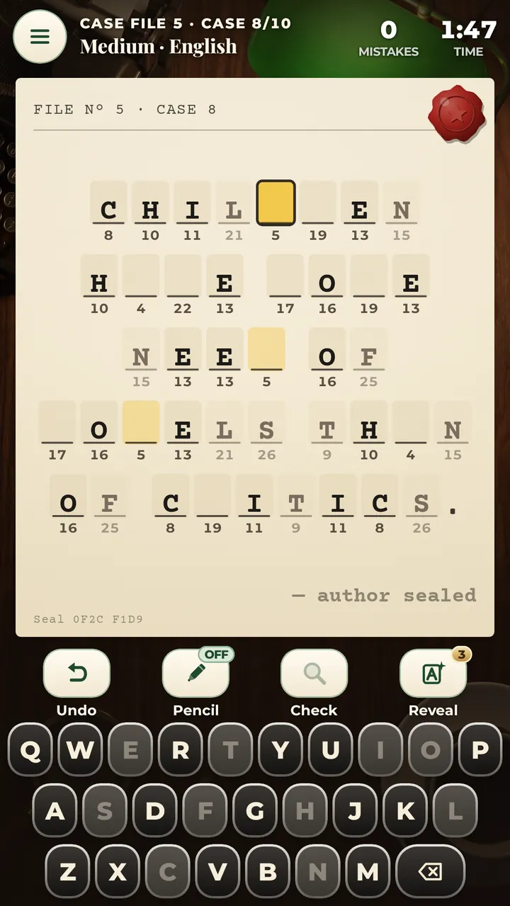 A case in progress on a cream sheet of paper: rows of letter boxes with small numbers underneath, a few letters typed in, the selected box highlighted in gold, and a typewriter keyboard below