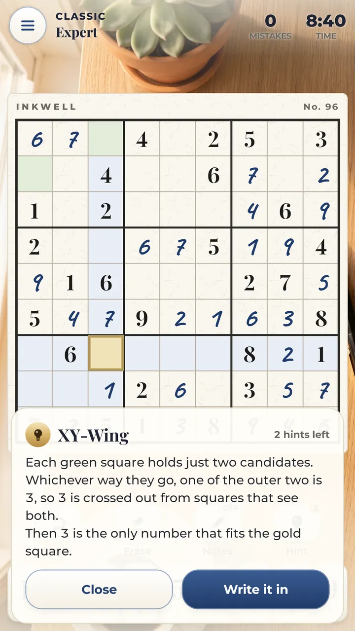 A hint on an Expert puzzle: the panel names the technique, XY-Wing, explains it in one sentence and highlights the squares that matter, with a Write it in button