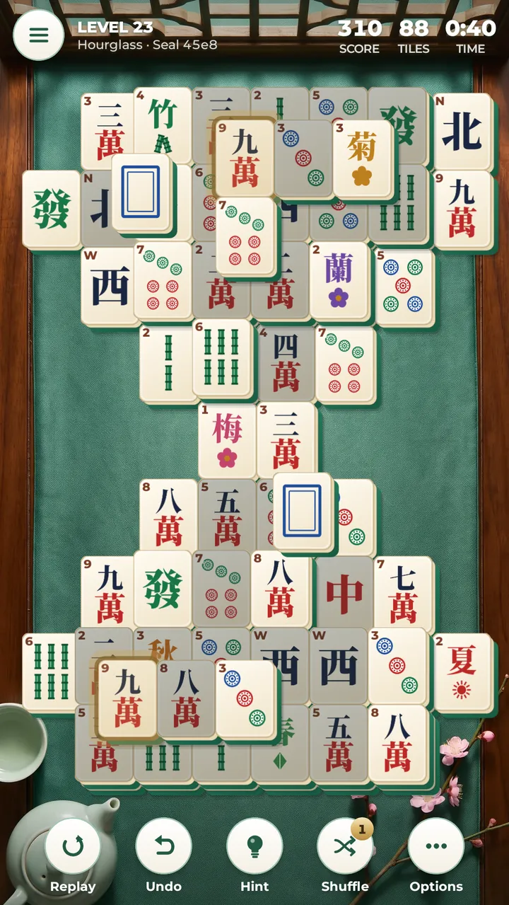 A free hint: two matching free tiles glow gold on the board